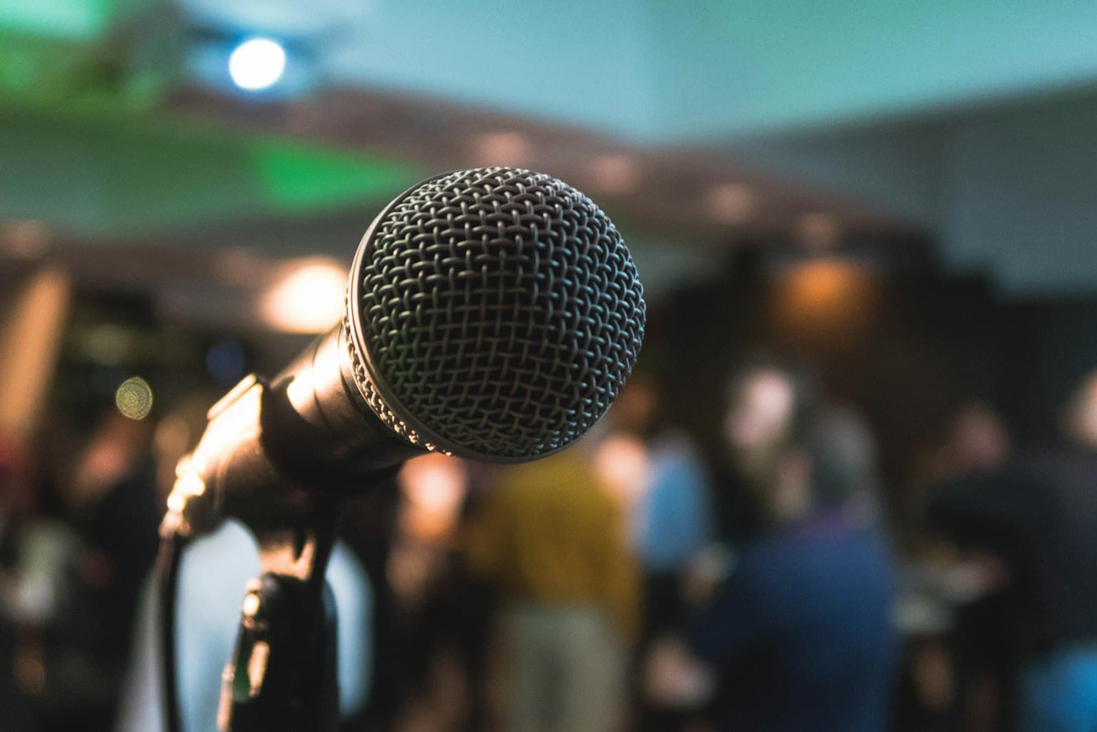 Speaker on stage delivering a keynote presentation